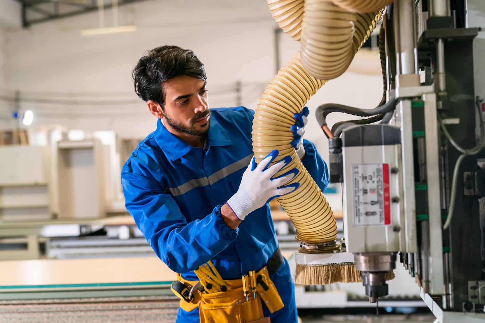 carpenters-assembling-furniture-business-young-man-in-production-of-furniture-factory-background-.jpg